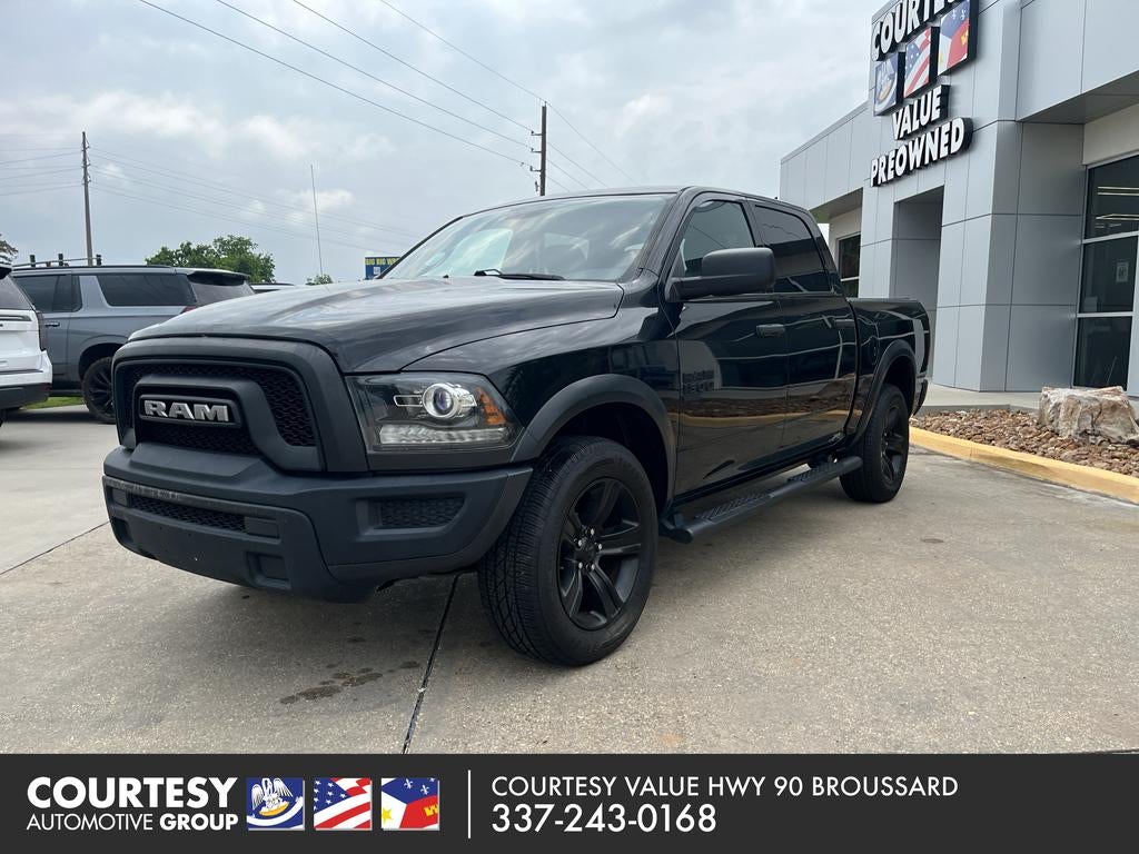 2022 RAM 1500 Classic Warlock in Diamond Black Crystal Pearlcoat — front three-quarter view