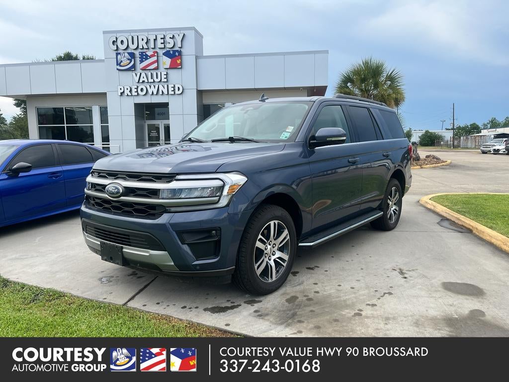 2022 Ford Expedition XLT in Infinite Blue Metallic Tinted Clearcoat — front three-quarter view
